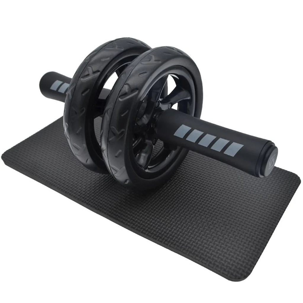 Black ab roller on a black mat with visible branding on a white background