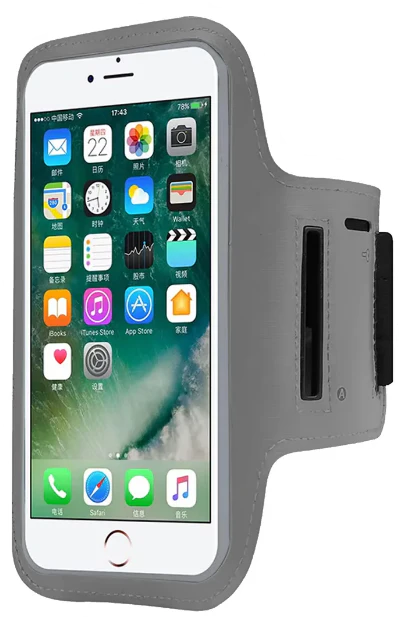 Gray phone armband with smartphone displaying app icons on a white background