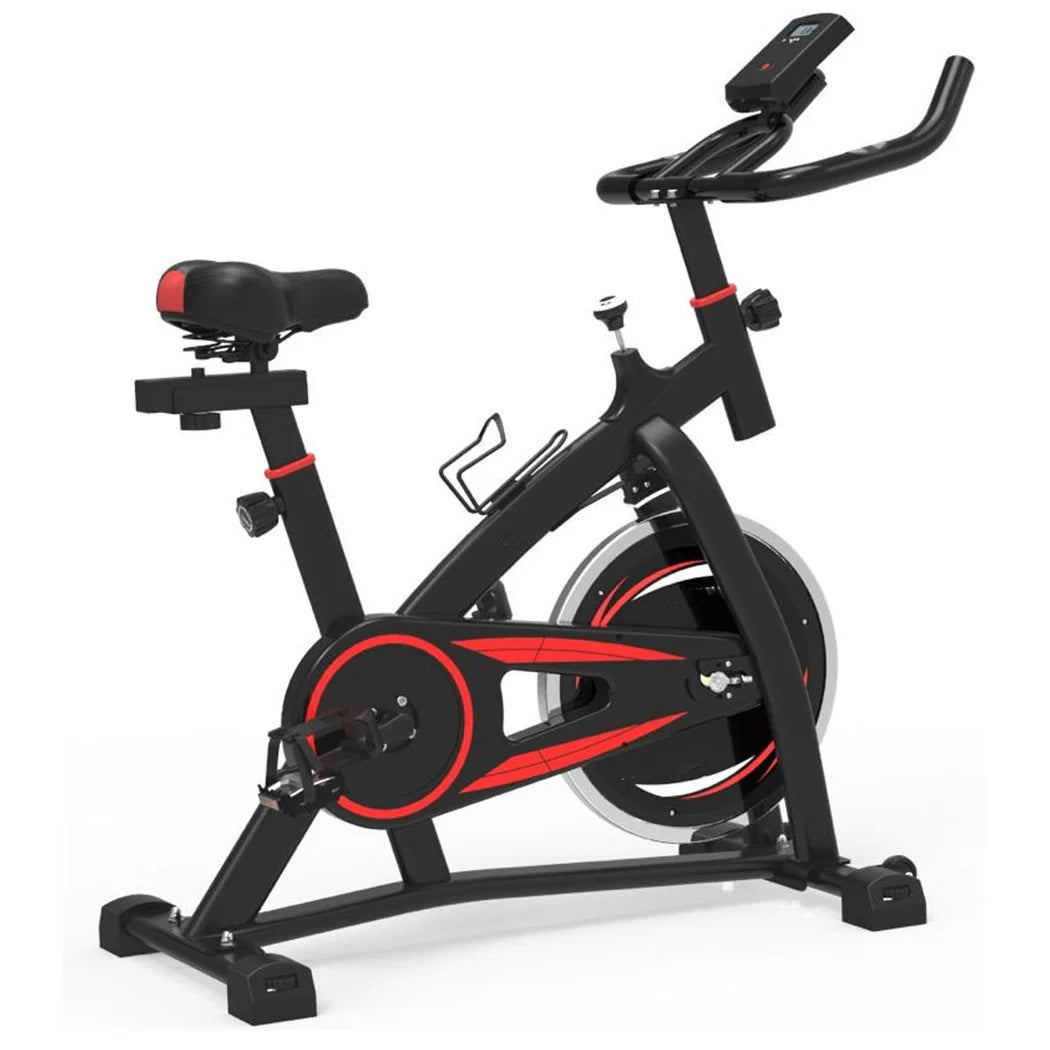 Black and red exercise bike on a white background