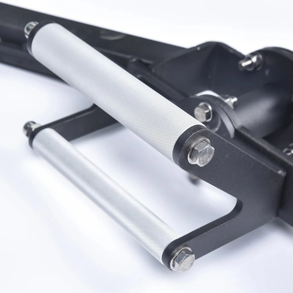 Close-up of a bicycle handlebar with white grips on a light gray background