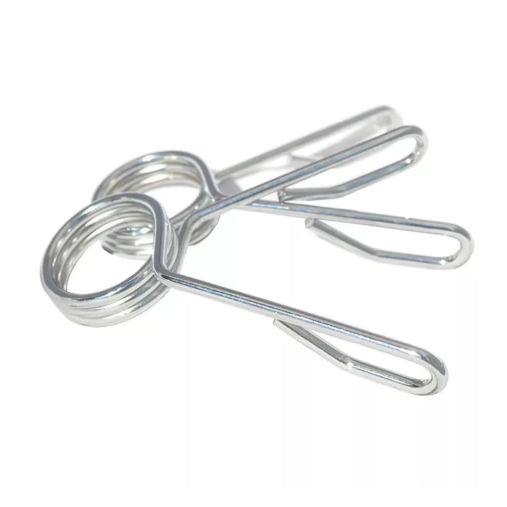 Metallic paper clips on a white background