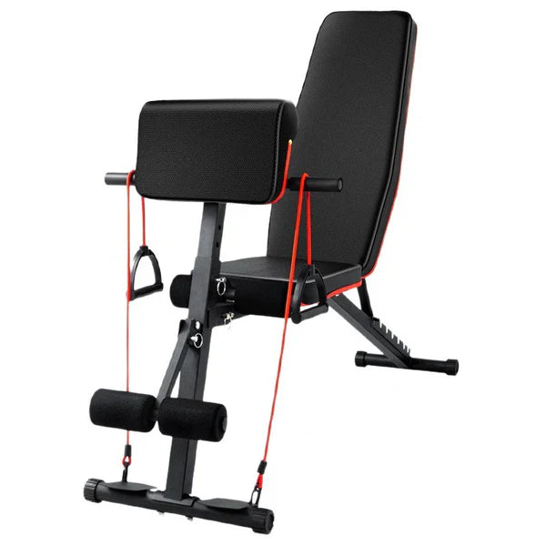 Black adjustable weight bench with resistance bands on a white background