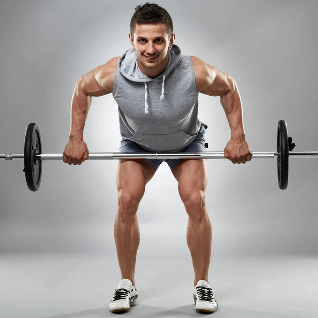 Man lifting a barbell with a gray background