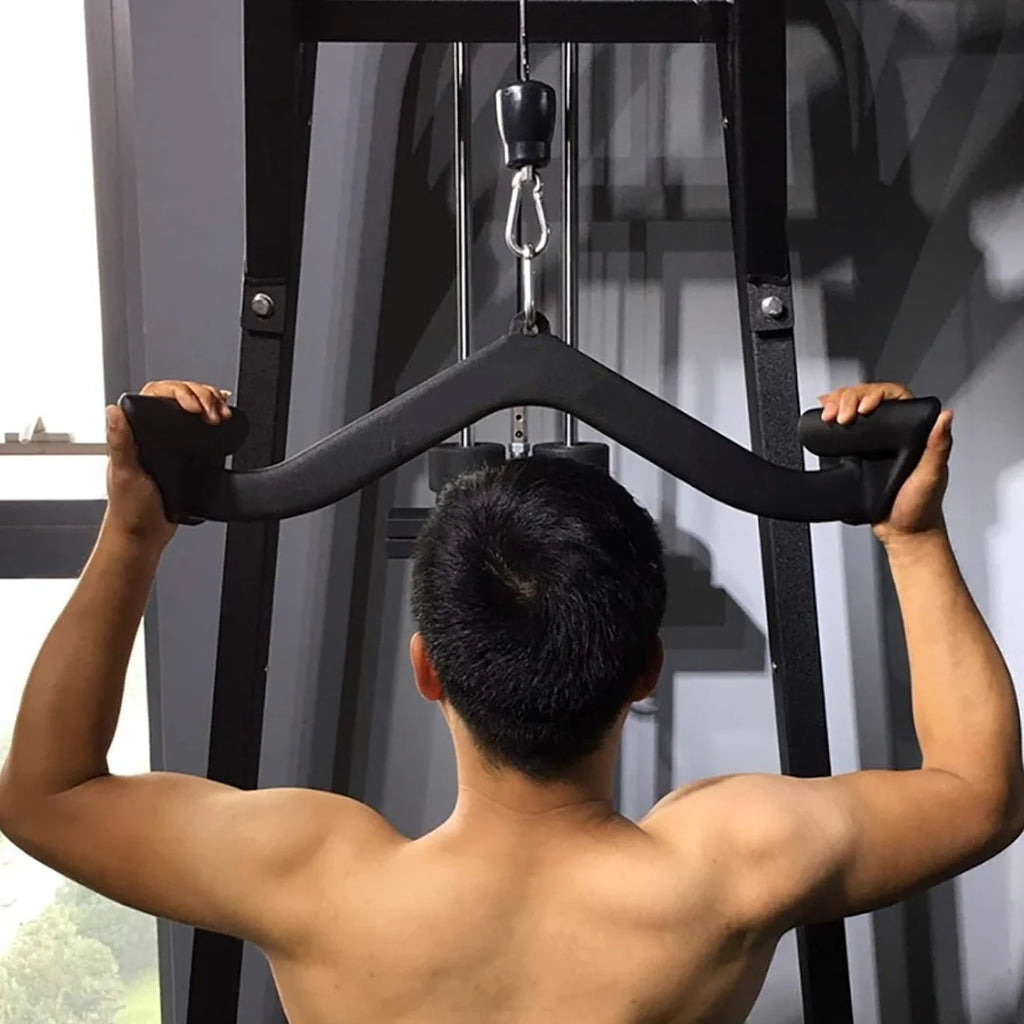 Person using a gym machine in a gym setting
