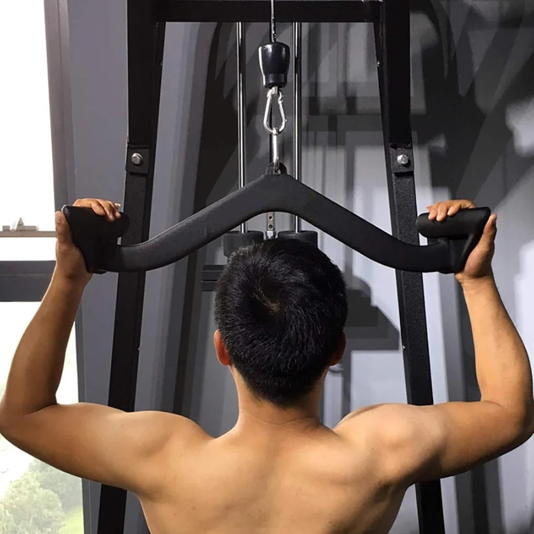 Person using a gym machine in a gym setting