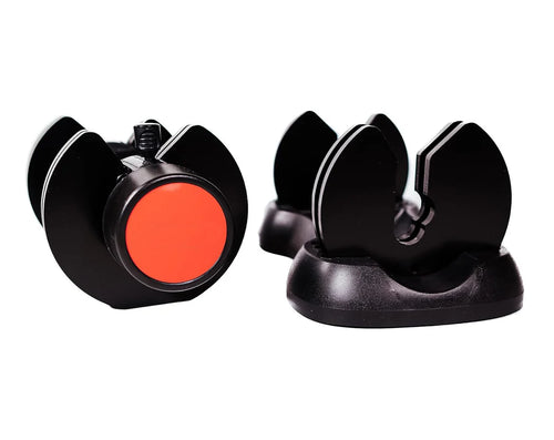 Two black and red knife sharpener devices on a white background