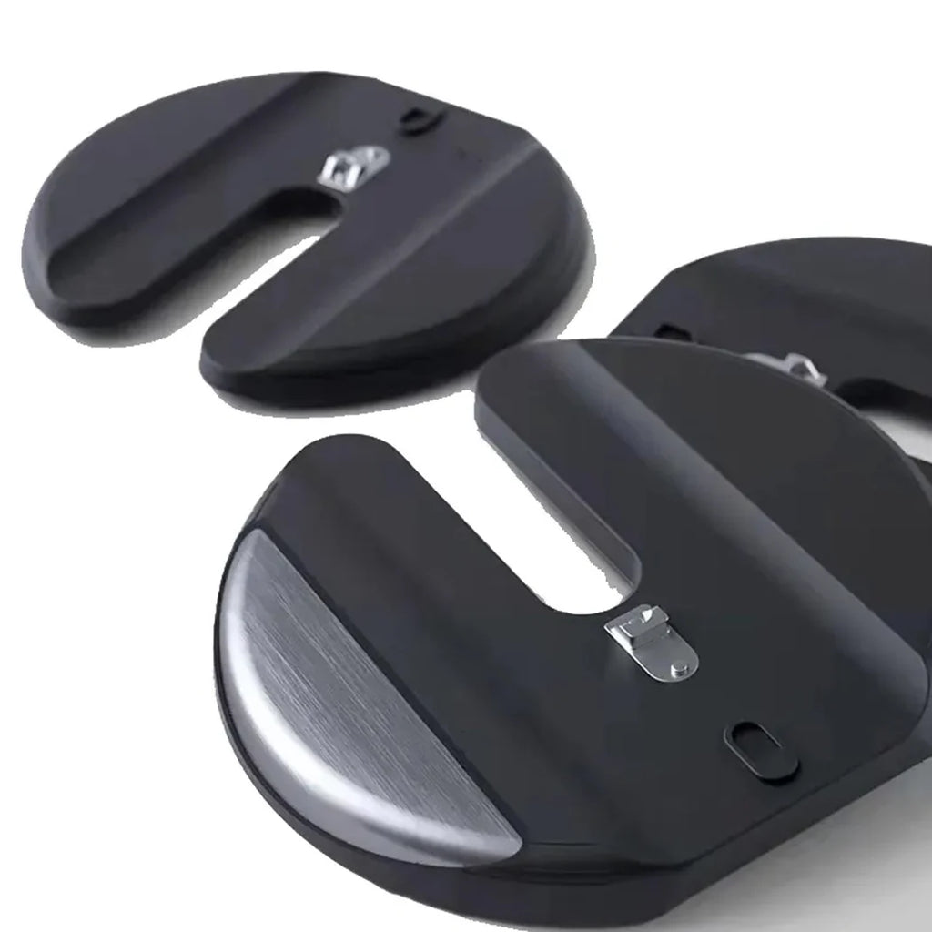 Two black car roof hooks on a white background