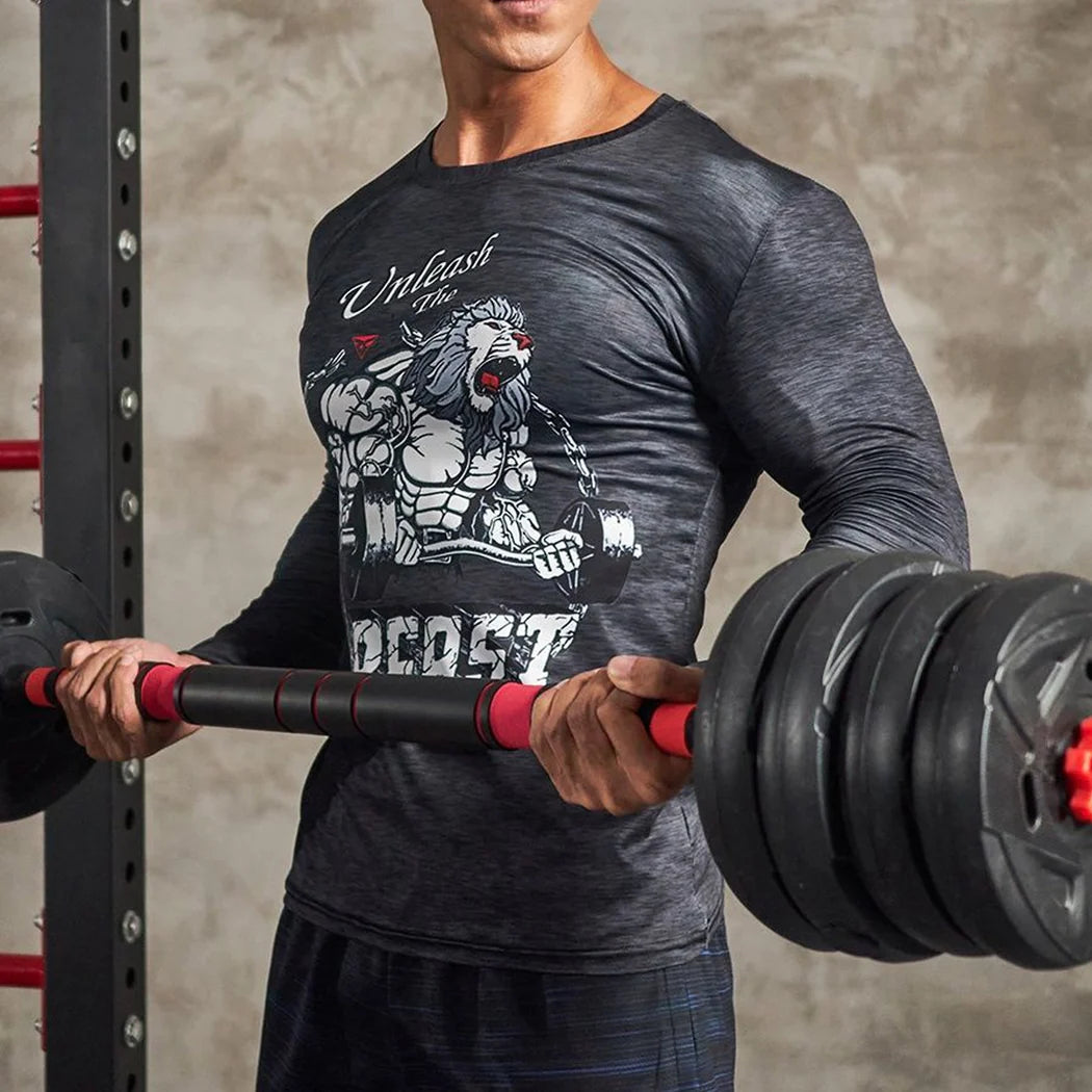 Person lifting weights wearing a graphic t-shirt with a lion design.