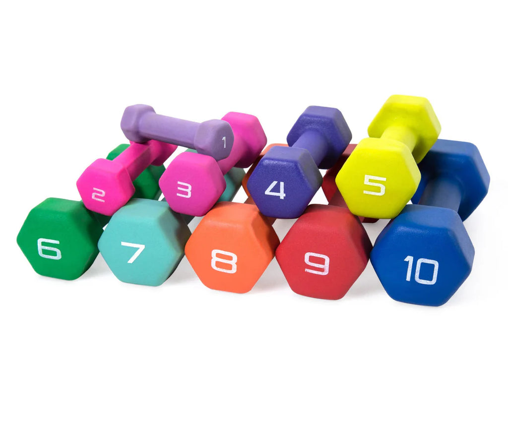 Colorful set of dumbbells with weight markings on a white background