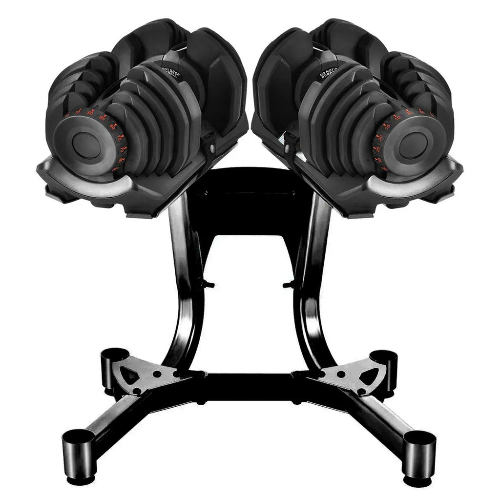 Pair of adjustable dumbbells on a black stand against a white background