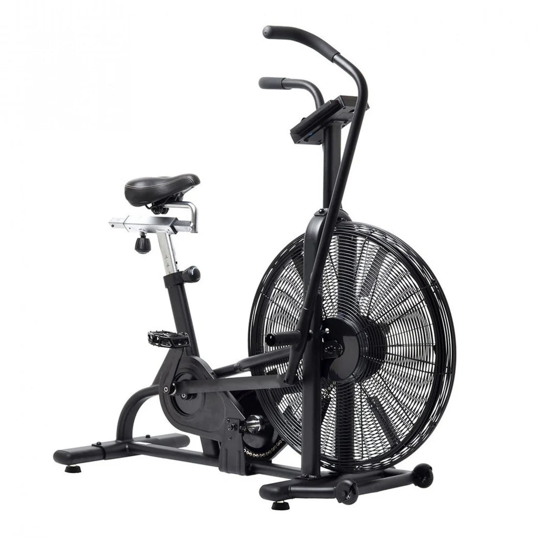 Black exercise bike with fan on a white background