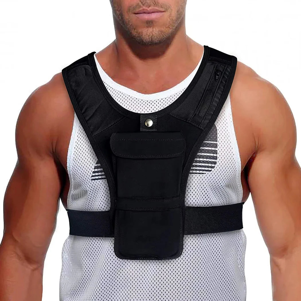 Man wearing a black vest over a white tank top on a white background