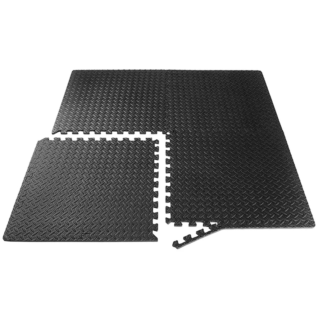 Black interlocking foam mats on a white background