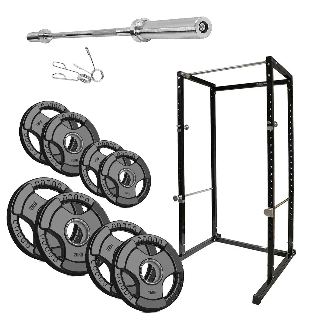 Gym equipment set including weight plates, barbell, and rack on a white background