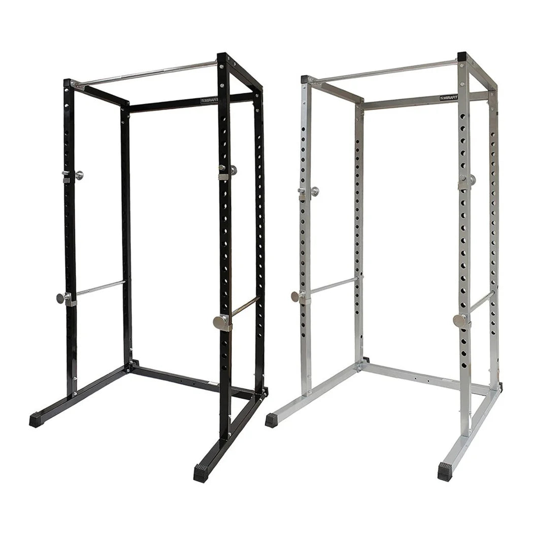 Black and silver power rack on a white background