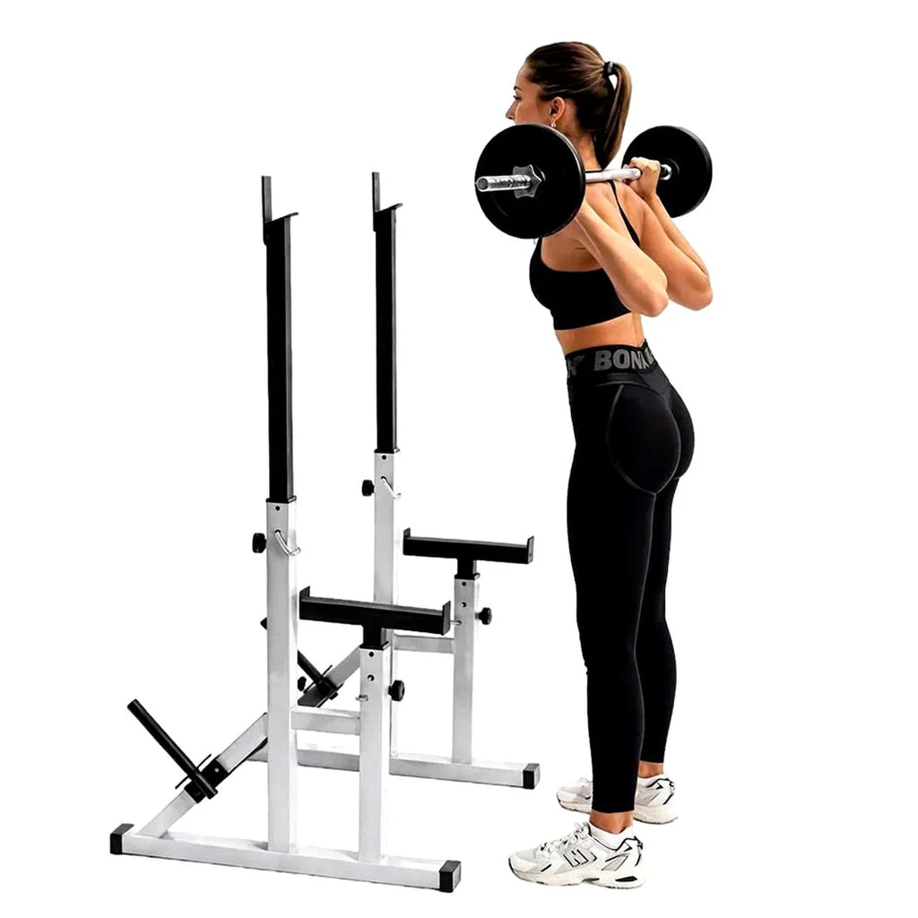 Woman exercising with a weight rack on a white background