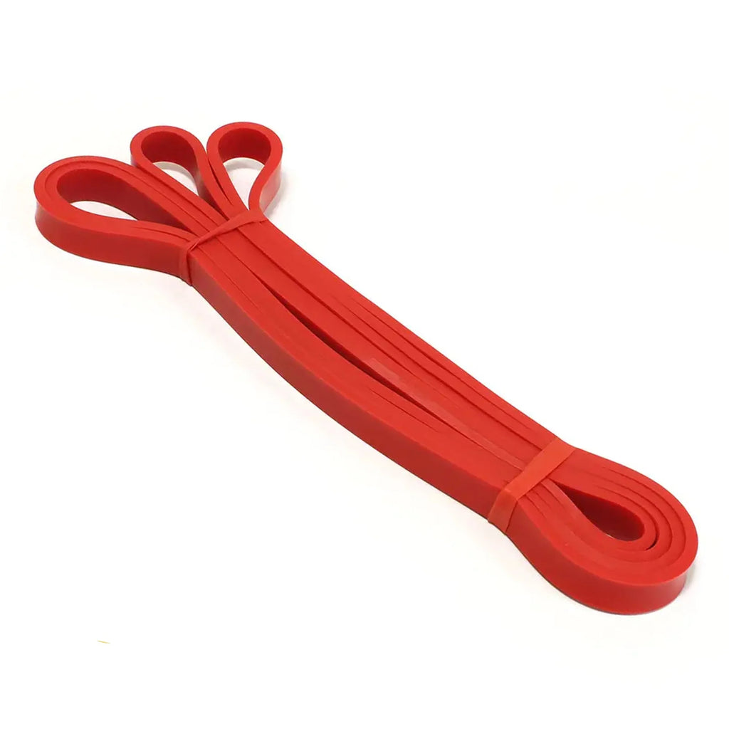 Red resistance band on a white background