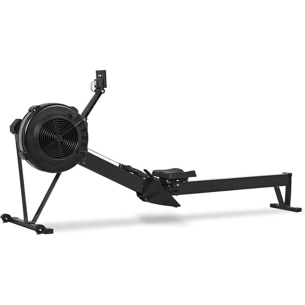 Black rowing machine on a white background