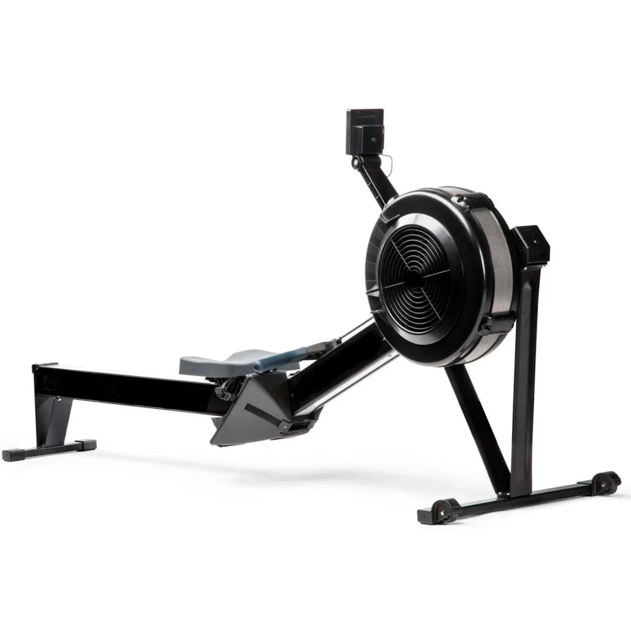 Black rowing machine on a white background