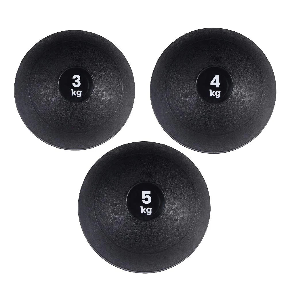 Three black slam balls with weight markings on a white background
