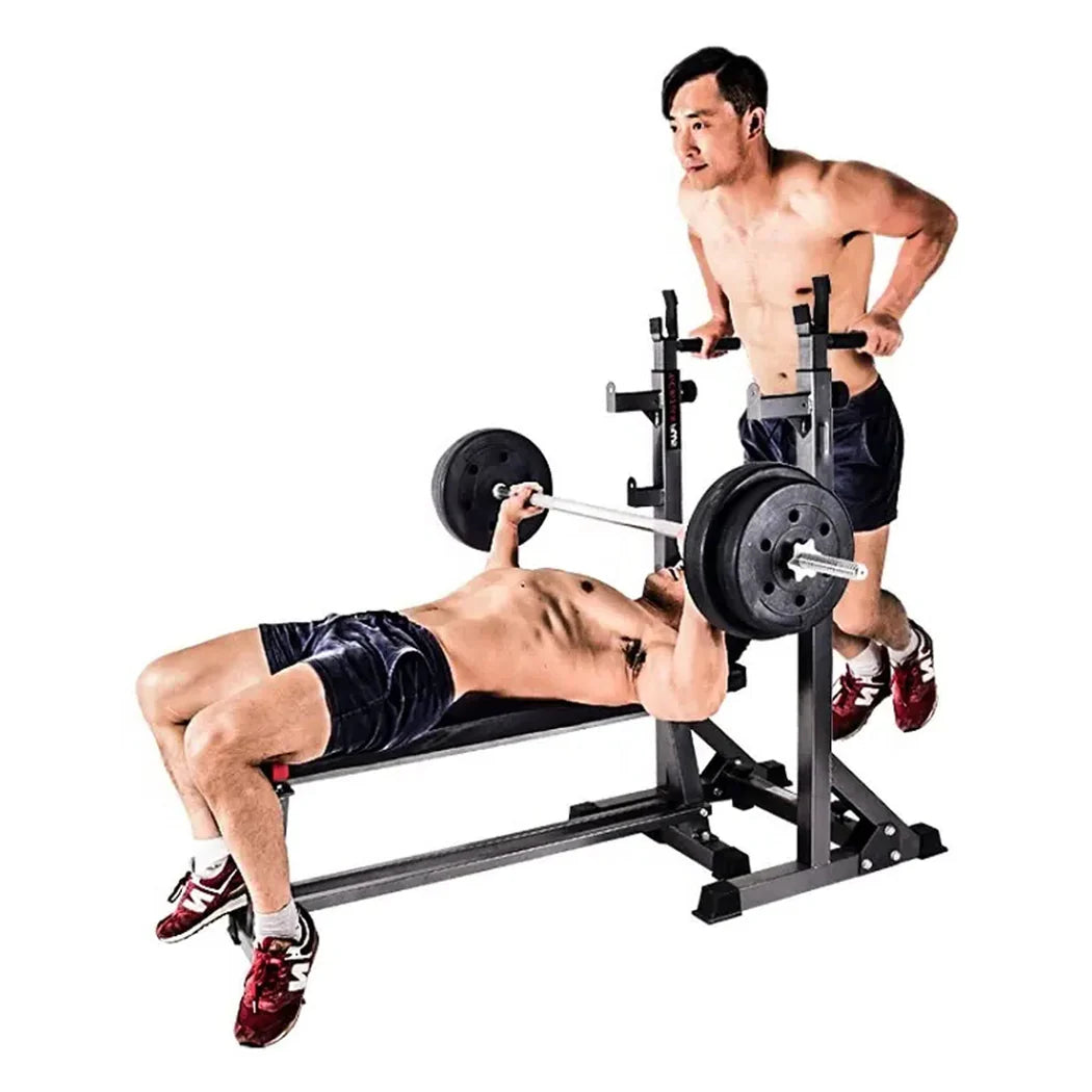 Two men working out with a weight bench and weights on a white background