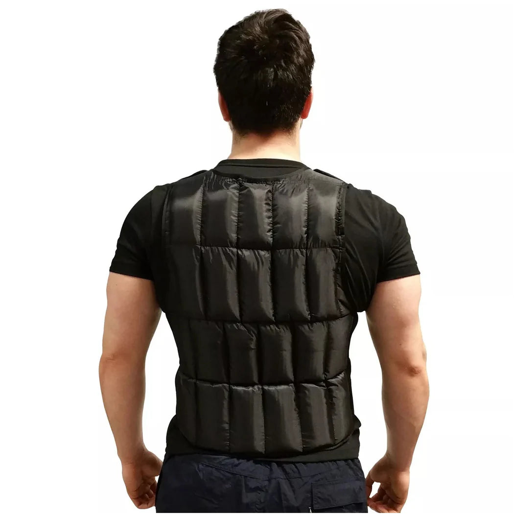 Person wearing a black weighted vest on a white background