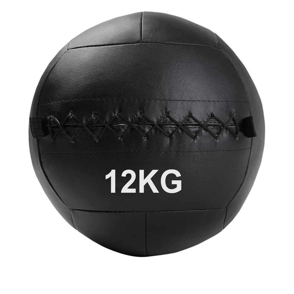 Black wall ball with '12KG' marking on a white background