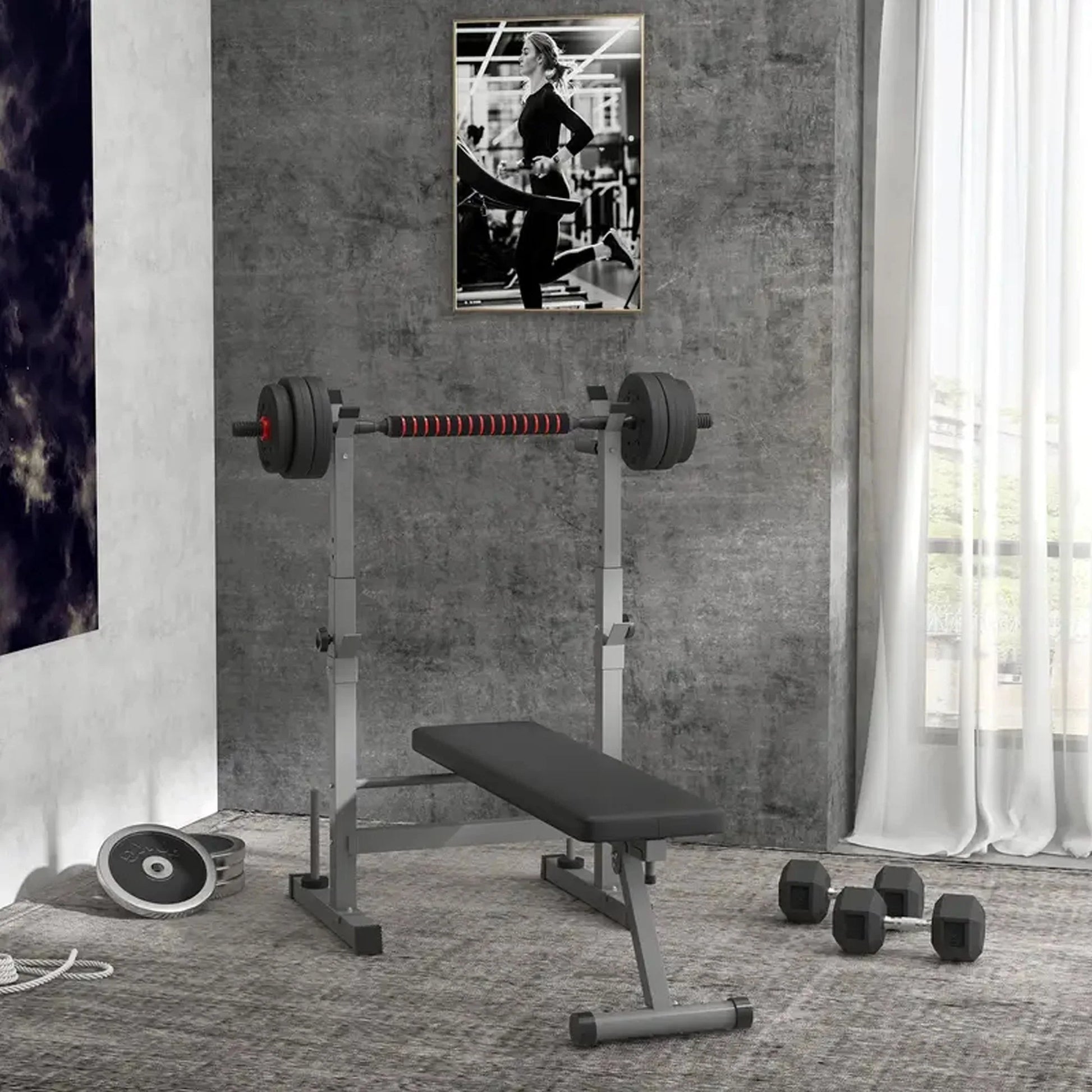 Gym bench with barbell and dumbbells in a room with a window and wall art.