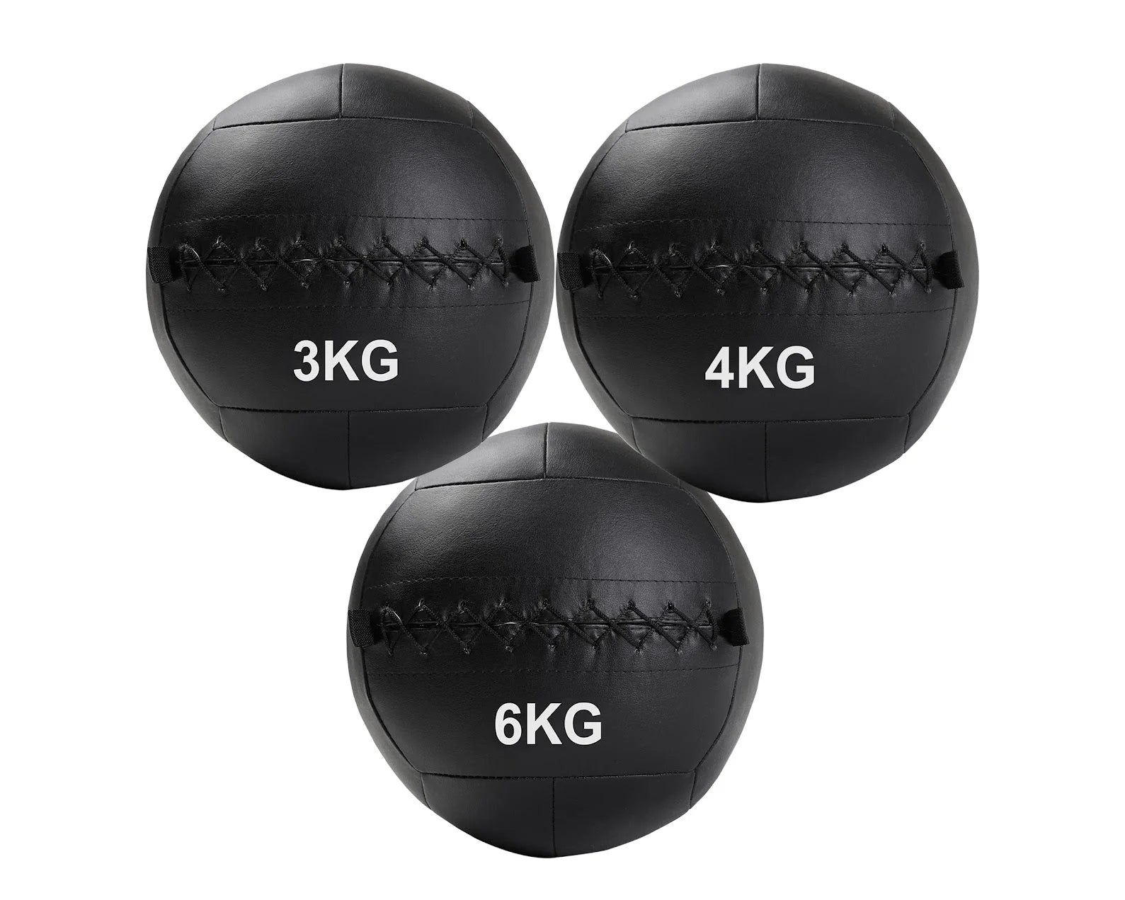 Three black wall balls with weight labels on a white background